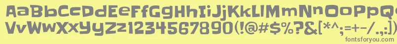 フォントSlackey – 黄色の背景に灰色の文字