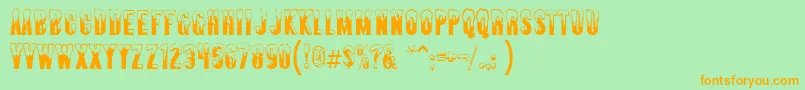 Almontesnow Font – Orange Fonts on Green Background