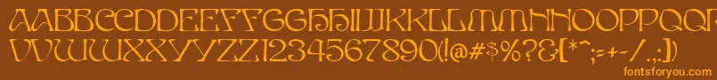 フォントElvesNormal – オレンジ色の文字が茶色の背景にあります。