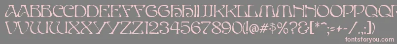 フォントElvesNormal – 灰色の背景にピンクのフォント