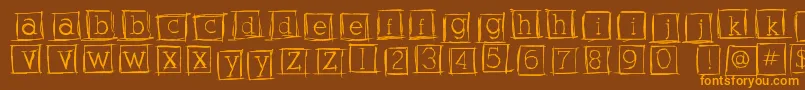 Alphabitssquared Font – Orange Fonts on Brown Background