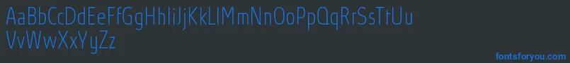 AbsolutProThincondensed Font – Blue Fonts on Black Background