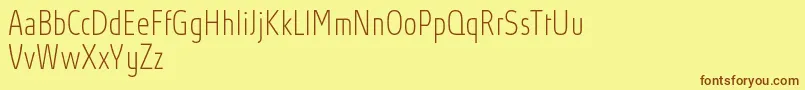 AbsolutProThincondensed Font – Brown Fonts on Yellow Background