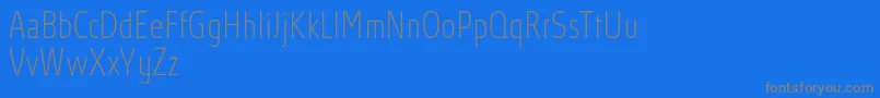 AbsolutProThincondensed Font – Gray Fonts on Blue Background