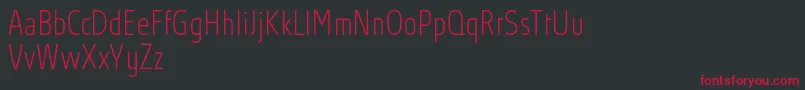 AbsolutProThincondensed Font – Red Fonts on Black Background