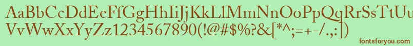 フォントAdobeCaslonRegular – 緑の背景に茶色のフォント