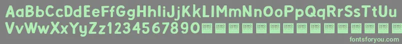 AlphaBetaDemo Font – Green Fonts on Gray Background