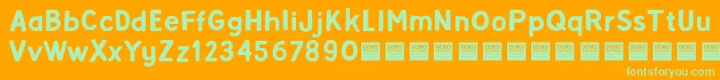 AlphaBetaDemo Font – Green Fonts on Orange Background