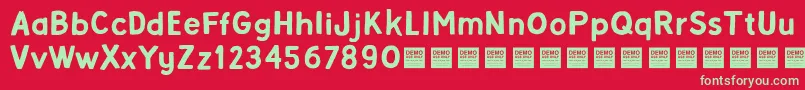 Czcionka AlphaBetaDemo – zielone czcionki na czerwonym tle