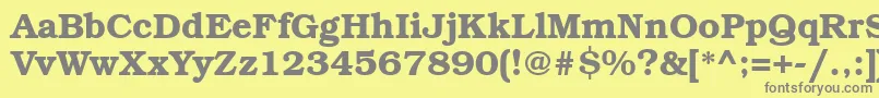 BookmanbttBold-fontti – harmaat kirjasimet keltaisella taustalla