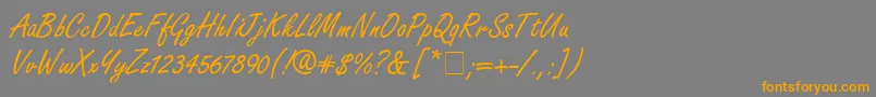 フォントFreestyleScriptitcNormal – オレンジの文字は灰色の背景にあります。