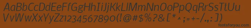 フォントNobileItalic – 黒い文字が茶色の背景にあります