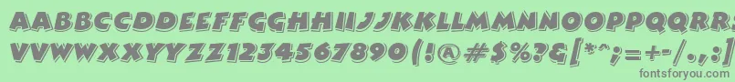 フォントGeComedy – 緑の背景に灰色の文字