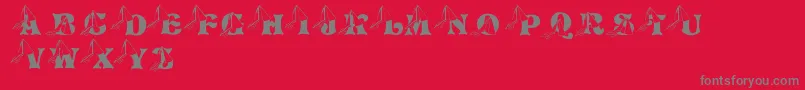 Fonte LmsPrincessCap – fontes cinzas em um fundo vermelho