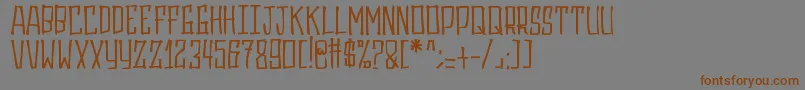 Gasrux Font – Brown Fonts on Gray Background