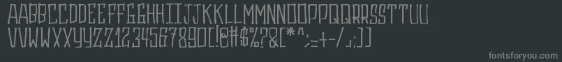 フォントGasrux – 黒い背景に灰色の文字