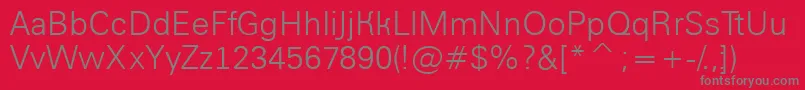 AGroticlt Font – Gray Fonts on Red Background