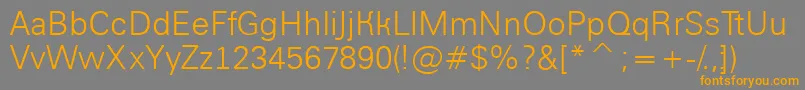 AGroticlt Font – Orange Fonts on Gray Background