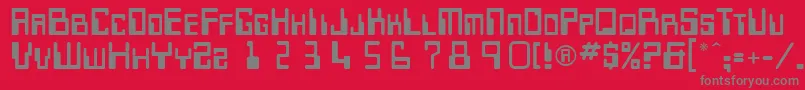 フォントKeypunch – 赤い背景に灰色の文字