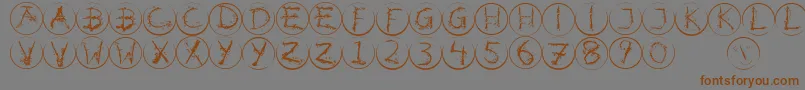 Inkalphabetrrings Font – Brown Fonts on Gray Background