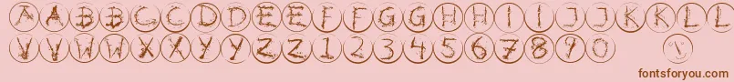 Inkalphabetrrings Font – Brown Fonts on Pink Background