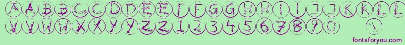 Inkalphabetrrings Font – Purple Fonts on Green Background