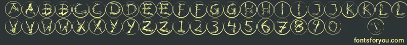 Inkalphabetrrings Font – Yellow Fonts on Black Background