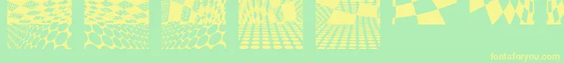 フォントKleinkarpets2 – 黄色の文字が緑の背景にあります