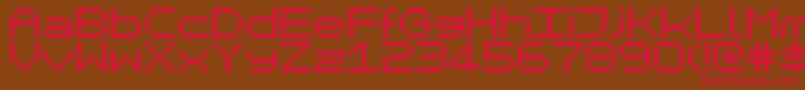 フォントMikrc – 赤い文字が茶色の背景にあります。