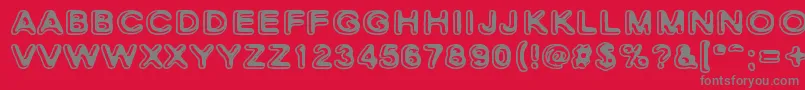 SkinnyZebra2-Schriftart – Graue Schriften auf rotem Hintergrund