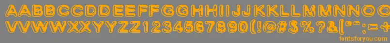 SkinnyZebra2-Schriftart – Orangefarbene Schriften auf grauem Hintergrund