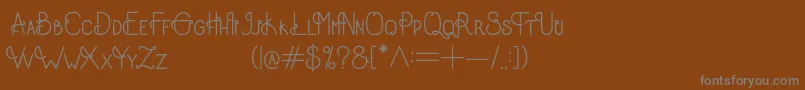 フォントOldAlpha – 茶色の背景に灰色の文字