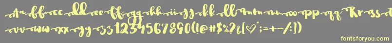 Justinroad Font – Yellow Fonts on Gray Background