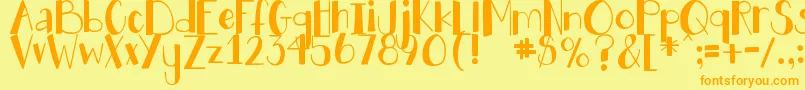 Czcionka DjbHollyJollyBgolly – pomarańczowe czcionki na żółtym tle