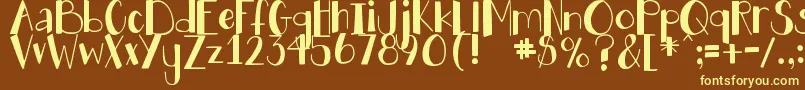 DjbHollyJollyBgolly Font – Yellow Fonts on Brown Background