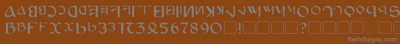 Anayanka-Schriftart – Graue Schriften auf braunem Hintergrund