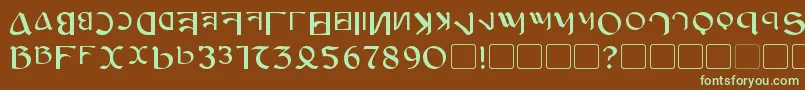 フォントAnayanka – 緑色の文字が茶色の背景にあります。