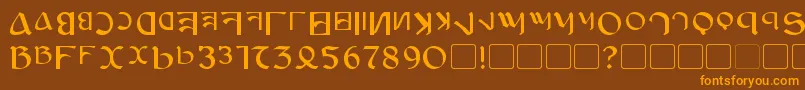 フォントAnayanka – オレンジ色の文字が茶色の背景にあります。