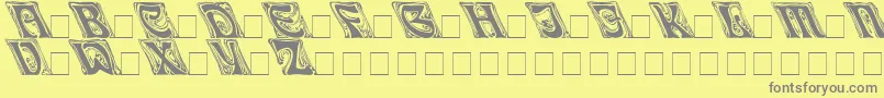 フォントIanbenttoleft – 黄色の背景に灰色の文字