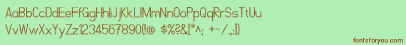 Шрифт ScrfibbleRegular – коричневые шрифты на зелёном фоне