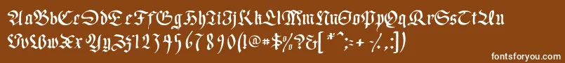 フォントWrittenfrax – 茶色の背景に白い文字