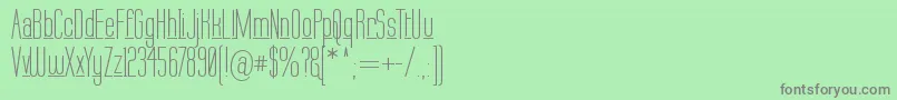 フォントLabtund – 緑の背景に灰色の文字