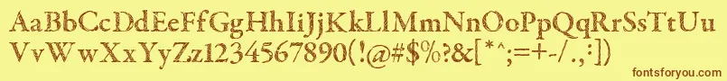 フォントTribalGaramond – 茶色の文字が黄色の背景にあります。