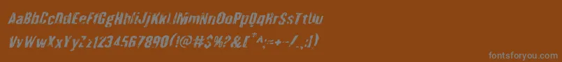 Quarrystoneital-fontti – harmaat kirjasimet ruskealla taustalla