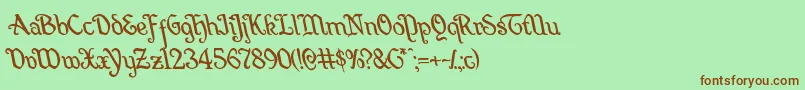 Quillswordleft-Schriftart – Braune Schriften auf grünem Hintergrund