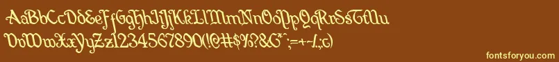 Quillswordleft-fontti – keltaiset fontit ruskealla taustalla