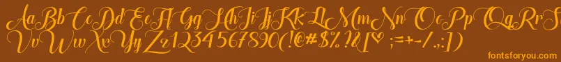 TheHeartOfEverythingDemo-Schriftart – Orangefarbene Schriften auf braunem Hintergrund