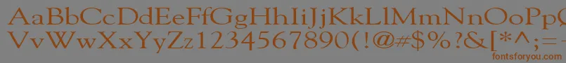 フォントGildebroadRegular – 茶色の文字が灰色の背景にあります。