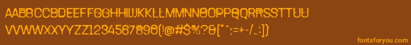 TamettePunkdomed-Schriftart – Orangefarbene Schriften auf braunem Hintergrund