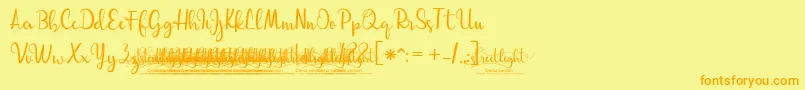 フォント03StreetlightDemoVersion – オレンジの文字が黄色の背景にあります。